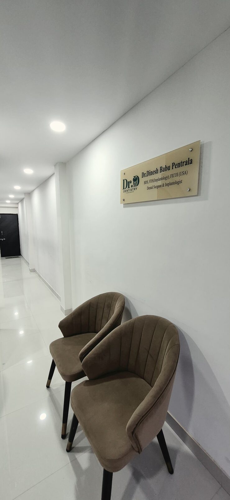 Waiting area and doctor's name plate at the clinic